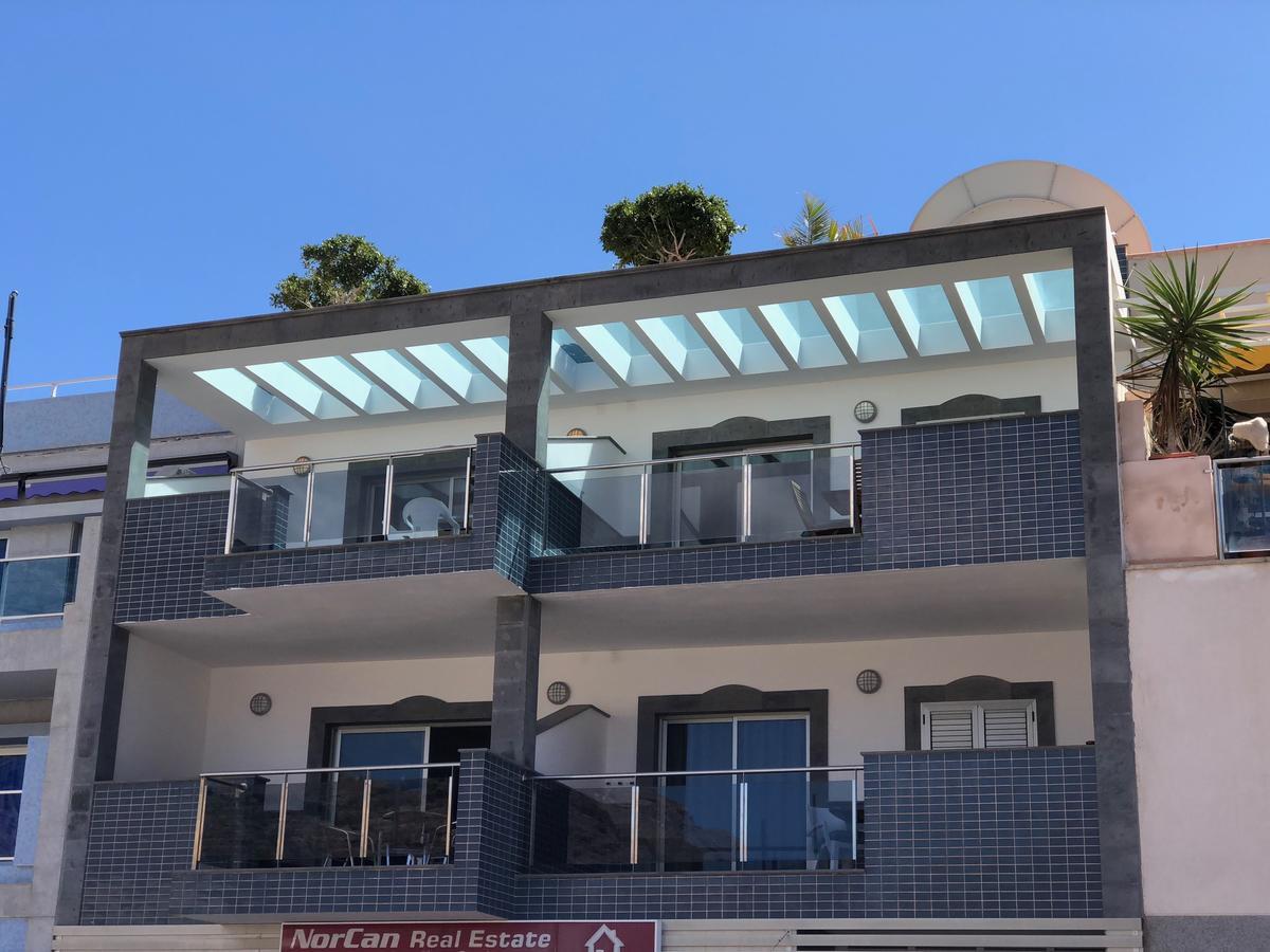 Billy'S Beachfront Apartment With Pool Access Puerto De Mogan Zewnętrze zdjęcie